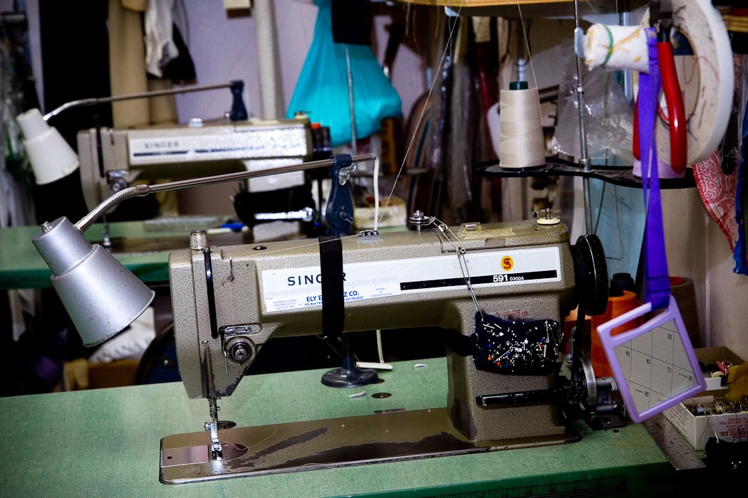 At the sewing machine